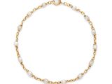 a gold chain bracelet with white pearls on a white background