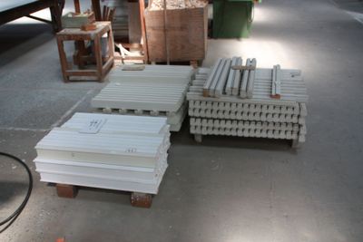 a lot of boxes and pallets on the ground