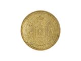 une pièce d'or sur fond blanc