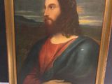 tableau représentant un homme aux cheveux longs et à la barbe, dans un cadre doré