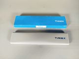 a close up of a blue box and a white box on a table