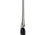 the black purse has a long chain hanging from it ' s side