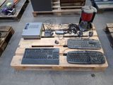wooden pallet with computer equipment on top of it in a warehouse