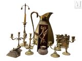 a lot of antique brass items on display