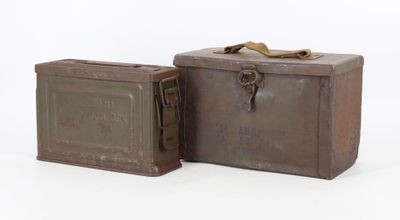 these are two old tins that are sitting next to each other