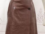 brown leather skirt with buttons on a mannequin mannequin mannequin mannequin mannequin mannequin mannequin mannequin mann