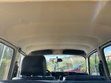 a view of the back of a car from the passenger seat