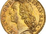 une pièce d'or représentant la tête d'une femme aux cheveux longs