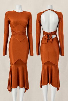 two mannequins wearing orange dresses on a mannequin mannequin