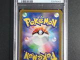 a close up of a pokemon trading card in a plastic holder