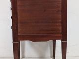 an image of a small wooden table with a drawer on it