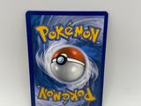 un gros plan sur un boîtier de jeu Nintendo Wii avec un Pokémon : « poke poke poke poke poke poke poke poke poke »