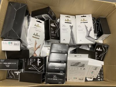 a cardboard box filled with many different types of electronic gadgets