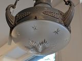 a light that is hanging from the ceiling in the room