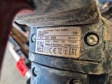 une image montrant un gros plan du moteur d'une moto