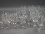 a lot of empty wine glasses sitting on a table