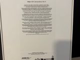 the back of a white box with a picture of the back of a white box