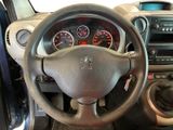 dashboard of a car with a steering wheel and dashboard gauges