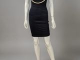 a mannequin dress with pearls and pearls on the shoulders