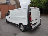 a white van that is parked in a parking lot