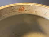 a close up of a bowl of food on a table