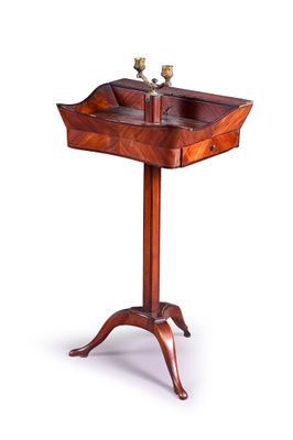 an image of a wooden table with a candle holder on it