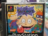 an image of a nintendo 64 game console with a box of games on it