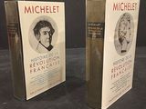 two books on a table with a picture of a man and a woman on the covers
