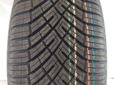 a close up of a tire on a white surface