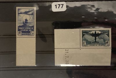 two stamps in a display case on the wall