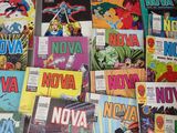 a lot of comic books on the table together