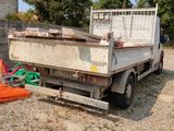 a truck that is parked in the dirt