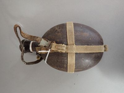 a wooden ball with a rope wrapped around it