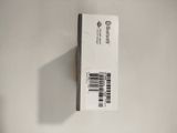 a white box with a barcode on it sitting on a table