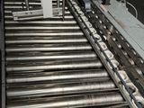 a picture of a conveyor belt in a factory