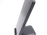 a cell phone that is sitting on a stand