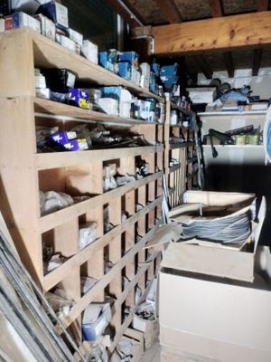 a room filled with lots of boxes and shelves