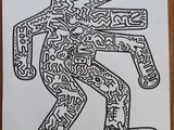 a piece of paper with a drawing of a man on it