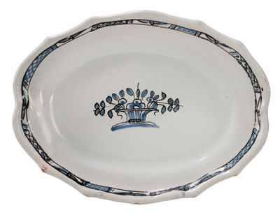 an image of a blue and white plate with a crown on it