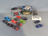 a lot of toy cars that are sitting on a table