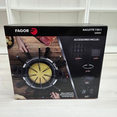 the box is open to show the contents of a kitchen appliance