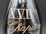 a bottle of wine with a picture of a man on it