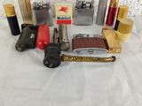 many different types of lighters and lighters on the table