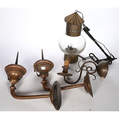 a light that is on the wall next to a lamp