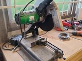 a machine that is sitting on top of a workbench