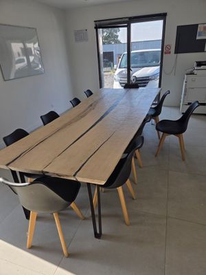 a large wooden table in the middle of a room