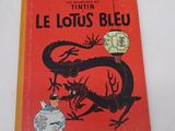 a red book with a black dragon on it