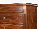 a close up of a wooden chest of drawers on a white background