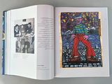 an open book with a picture of a clown on it