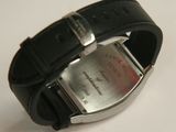 a close up of a wrist watch on a white surface